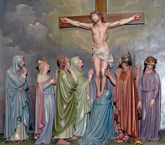 An image of Jesus crucified. A group of people stand around him, including his mother, Mary, and John.