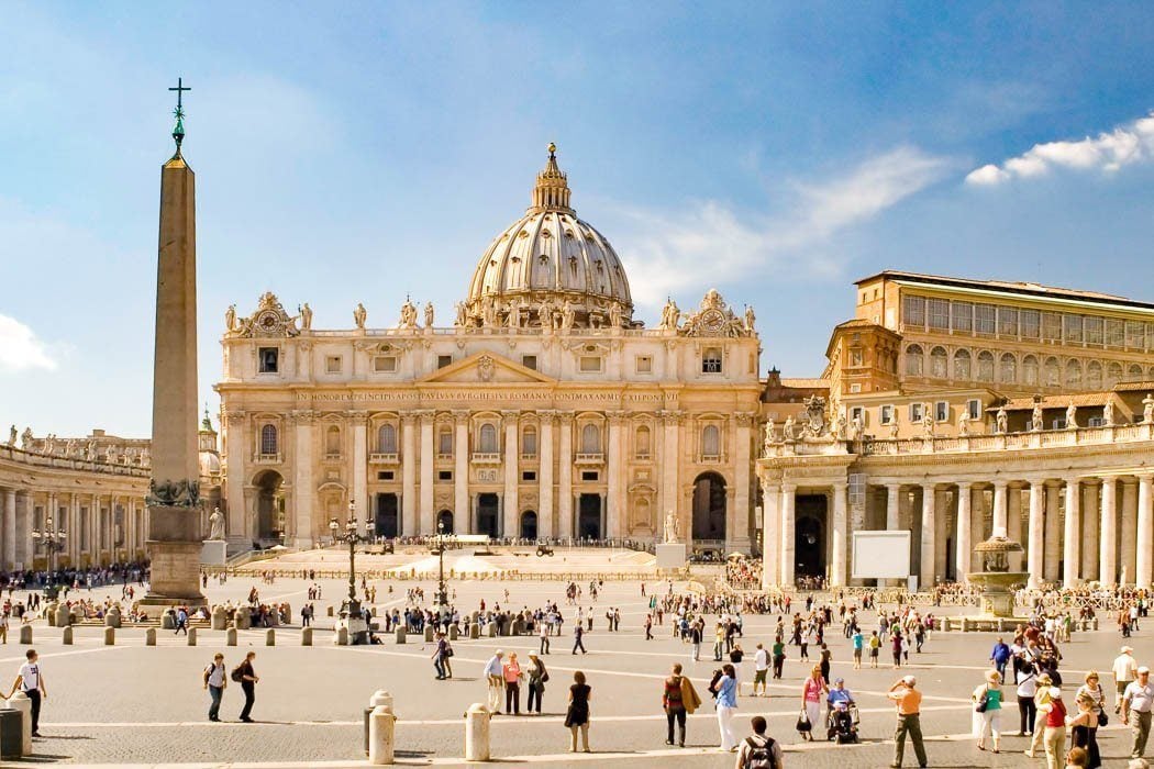 A picture of St. Peter's Square, with the obelisk and a crowd